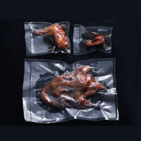 Pochette sous vide de qualité alimentaire sur mesure 121 ° Sac en aluminium transparent résistant aux hautes températures pour viande et saucisses