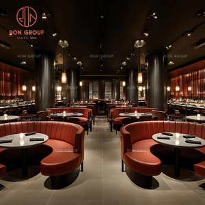 Conjunto de Muebles Comerciales para Restaurante: Sofá de Cuero Rojo con Base Redonda de Metal, Mesas de Mármol y Sillas Rojas a Juego para Cafetería - Product Image 4