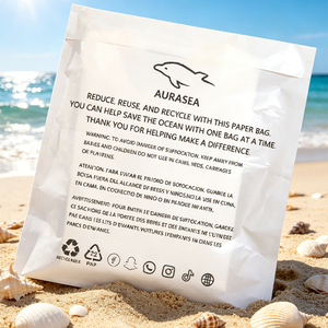 ถุงกระดาษแก้วย่อยสลายได้ พิ<span class=keywords><strong>ม</strong></span>พ์โลโก้ได้ตา<span class=keywords><strong>ม</strong></span>ต้องการ บรรจุภัณฑ์เสื้อผ้า ได้รับการรับรองมาตรฐาน FSC บรรจุภัณฑ์เสื้อผ้ารักษ์โลก ยั่งยืน - Product Image 1