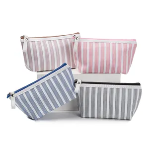 Wholesale creative travel lady cosmetic bag striped printed portable travel storage bag new hand bag toilet with bottom part