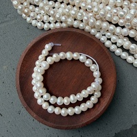 Perles d'eau douce presque rondes de 9-10 mm avec de grands trous d'une ouverture de 2,5 mm, naturelles, non nucléées, d'environ 36 cm de long avec 42 perles