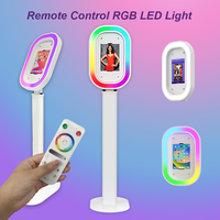 Machine Photobooth Portable avec Lumières LED Colorées et iPad, Équipée d'un Flight Case – Idéale pour Événements et Réseaux Sociaux, Prix Abordable