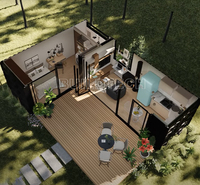 Conteneur d'expédition modulaire noir en forme de L 20 pieds Studio espace de travail confortable avec chambre à coucher au Canada