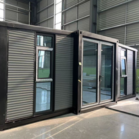 Maison conteneur préfabriquée à double aile pliable et extensible, à haute isolation, pour hébergement temporaire sur les chantiers de construction