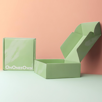 Boîte postale en papier ondulé vert imprimé avec logo personnalisé avec doublure en éponge T-shirt vide pour vêtements Sous-vêtements et boîtes cadeaux
