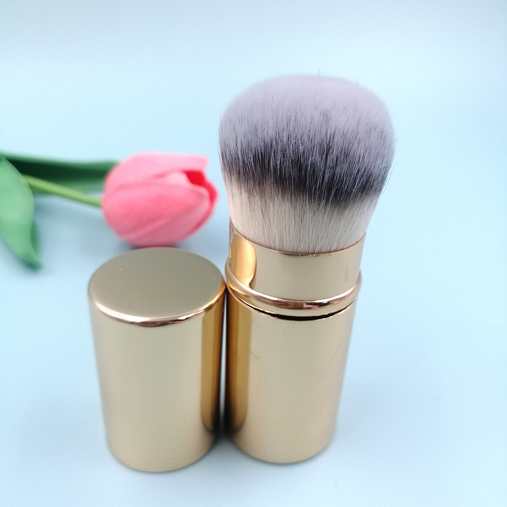 แปรงแต่งหน้าสีทอง