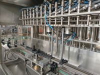 Ligne de production Offre Spéciale automatique de remplissage et d'emballage d'huile moteur de lubrifiant de bouteille de piston de Type linéaire