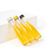 Bouteille en verre ronde miniature de 30 ml de qualité supérieure pour la vodka, le whisky et les spiritueux, emballage de luxe personnalisable pour les spiritueux