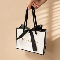 Sac d'emballage en carton blanc personnalisé avec logo estampé à chaud doré, pour bijoux et vêtements, avec nœud en ruban – Vente en gros
