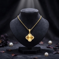 Collier pendentif trèfle à quatre feuilles en acier inoxydable plaqué or 18 carats avec diamants incrustés, design filigrané, chaîne en bambou pour femme Dongguan