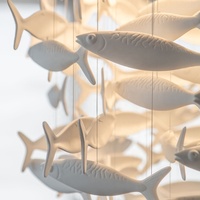 Projet d'hôtel moderne longue suspension en métal céramique poisson lustre design d'éclairage élégant