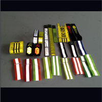 Offre Spéciale haute lumière loisirs sport logo personnalisé noir réfléchissant élastique PVC BRASSARD reflètent bracelet pour la nuit la sécurité de marche