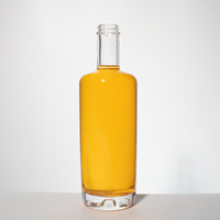 Bouteilles de liqueur rondes en verre extra-flint de 750 ml avec estampage doré et couvercle