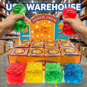 Nouveauté USA : Lot de 48 balles de décompression en gelée de pétrole super douces, malléables et non rebondissantes, en forme de fromage à presser de 6 cm, jouet promotionnel - Product Image 1