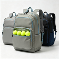 Sac à dos de tennis gris avec garniture bleue, sac de raquette, sac à balles doublé, poche zippée, poche latérale, sac à usage spécial personnalisable