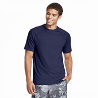 Vente en gros de chemises de surf pour hommes de haute qualité, manches courtes, anti-UV, rash guard, séchage rapide, 100% polyester, vêtements de sport, sports nautiques