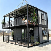 Maison conteneur préfabriquée multi-étages avec escalier métallique extérieur, design moderne, étanche à l'humidité, démontable, 2 chambres