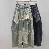 Jeans en denim baggy à jambe large pour femme, taille haute, déchiré, avec patch étoile, ourlet brut, coupe droite, style rétro Y2K chic, collection Printemps Automne 2026, vente en gros