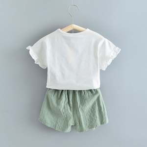 เสื้อผ้าเด็กผู้หญิงขายส่ง เสื้อลูกไม้ลายตัวอักษรดอกไม้ รุ่นต่างๆ กางเกงสีพื้นสำหรับเด็ก ผลิตในจีน - Product Image 4