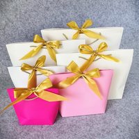 Sac cadeau en papier blanc pour femmes, sac d'emballage très vendu avec ruban pour les vêtements et les cadeaux