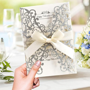 Elegantes Tarjetas de Invitación de Boda, Invitaciones de Corte Láser Color Marfil con Lazo y Sobres, Invitaciones en Blanco - Product Image 1
