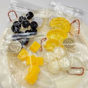 Toysrunner Premium - Juguetes Blandos de Frutas de Imitación, 12 Piezas, Colección Mini Frutas, Alivio del Estrés, Juguetes Sensoriales para Apretar, TPR/PU - Product Image 1