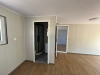 Maison de conteneur à double aile en acier de haute qualité de 20 pieds Bâtiment de conteneur pliant préfabriqué en paquet plat