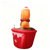Homme en pain d'épices gonflable de Noël de 1,80 m dans une tasse de chocolat chaud avec guimauves et lumières LED, décoration de jardin extérieure pour les fêtes