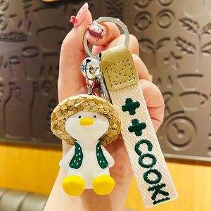 Wholesale Resin 3D Cartoon Happy Duck Keychain Cute Woven Straw Hat Duck Exquisite Accessories Bag Pendant Gift <b>Key</b> <b>Chain</b> - Product Image 5