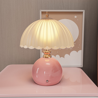 Lampe de chevet créative, sophistiquée et légèrement luxueuse en céramique et verre, avec lumière décorative d'ambiance