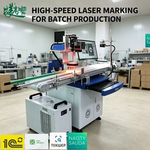 Machine de marquage laser par lots pour boîtes de chocolat et bonbons, avec inspection visuelle et rejet automatique des défauts, pour la traçabilité des emballages alimentaires - Product Image 1