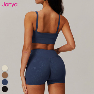 Janya nữ phòng tập thể Dục Đào Tạo giản dị Bộ thể thao vàng nóng vẻ đẹp trở lại miếng đệm có thể tháo rời áo ngực + không có đường may phía trước tập thể dục yoga quần short Bộ - Product Image 3