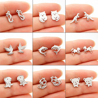 Vente en gros de boucles d'oreilles en acier inoxydable série animaux de dessin animé boucles d'oreilles femmes mode chat oiseau requin ours dinosaure pour fille