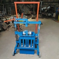 Machine à fabriquer des blocs creux emboîtables, petite machine à briques en ciment manuelle, haute performance, haut niveau de sécurité, à vendre