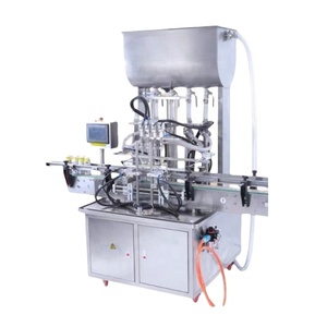 Machine de remplissage de bouteilles de liquide électrique commerciale pour usine, avec quatre buses, remplissage automatique de liquide pour une production élevée - Product Image 1