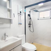 Bureau modulaire blanc en conteneur, maison préfabriquée portable avec fenêtres à cadre noir et structure en acier robuste, installation rapide