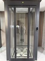 Puerta Plegable Eléctrica Negra para Viviendas, Puerta de Ascensor Plegable Automática e Inteligente
