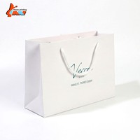 Sac en papier blanc imprimé avec logo personnalisé, sac de luxe pour boutique, sac de shopping avec poignée en corde pour l'emballage de vêtements, cadeaux et vente au détail