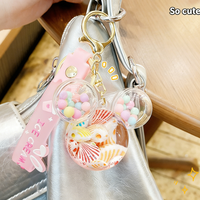 Nouveauté : Porte-clés en forme de coquillage à paillettes liquides sur le thème de l'océan, parfait pour les clés de voiture, les sacs à dos, comme cadeau