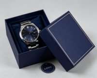 Boîte cadeau de luxe pour montre bleu marine avec surpiqûres dorées, logo personnalisé, emballage rigide en papier, doublure en velours, pelliculage mat et éponge