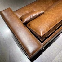 Canapé une place de style vintage, rétro français, en cuir véritable huilé, pieds en bois, forme octogonale, convertible pour dormir
