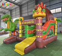 Château gonflable sur le thème des dinosaures avec toboggan pour la location