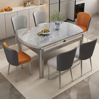 Ensemble table et chaises de salle à manger rectangulaire extensible moderne de luxe avec plateau en pierre frittée écologique et pieds en bois pour restaurant