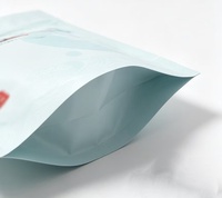 Sac imprimé OEM ODM en forme d'os, emballage Mylar à fermeture éclair scellé sur trois côtés pour friandises lyophilisées pour animaux de compagnie