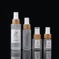 Flacon pompe en verre givré de 30 ml avec couvercle en bambou pour produits de soin de la peau