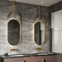 Miroir ovale incassable avec cadre étanche moderne pour salle de bain, lumière LED, maquillage intelligent décoratif avec affichage de l'heure