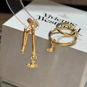 Boucles d'oreilles pendantes Vivienne Simple Line Small Saturn en alliage de zircon, luxe léger, style unique, punk, cercle, unisexe - Product Image 2