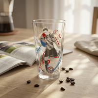 Gobelet en verre imprimé avec un motif d'étoiles sur le thème du football