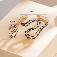 Jachon Ensemble de bijoux en métal léopard Ensemble de bracelets et bagues ajustables en forme de S pour femmes Accessoires audacieux