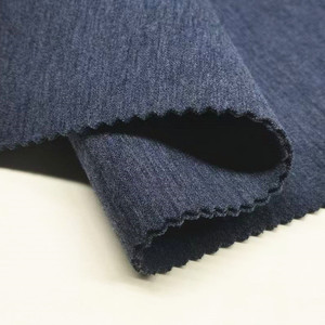 ผ้าถักอินเตอร์ล็อคยืดได้ หนา 330 แกรม ผลิตจากผ้าฝ้าย 55% โพลีเอสเตอร์ <span class=keywords><strong>39</strong></span>% และอีลาสเทน 6% ย้อมสีพื้น สำหรับตัดเย็บเสื้อสูทเด็กผู้ชาย - Product Image 1